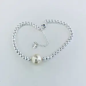 Pulsera Enchapada en Plata con Perla Schell 18 Cm. más Alargue