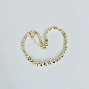 Pulsera de Balines Enchapada en Oro 18 Cm. más alargue