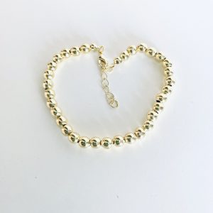 Pulsera con Balines Enchapados en Oro